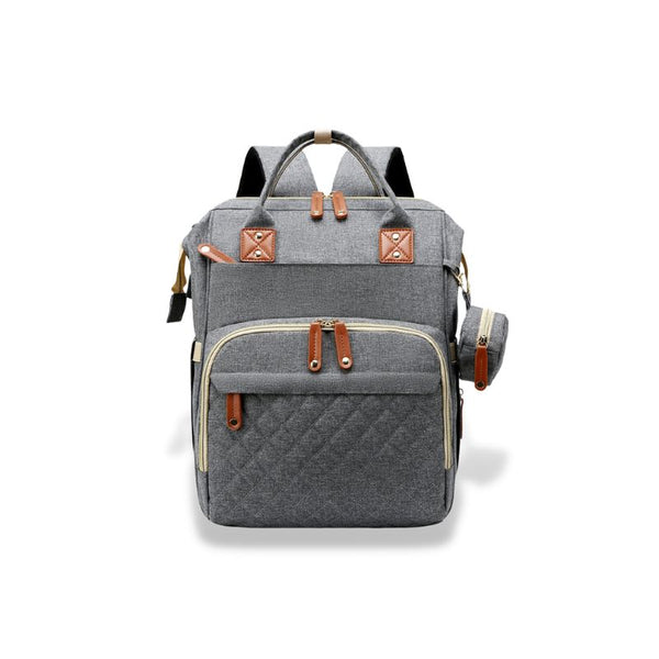 Sac à dos à langer gris, design élégant avec poches multiples pour une organisation optimale.