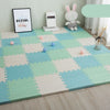 Variante Vert-Blanc-Bleu du tapis d'éveil bébé pour un espace doux et coloré.