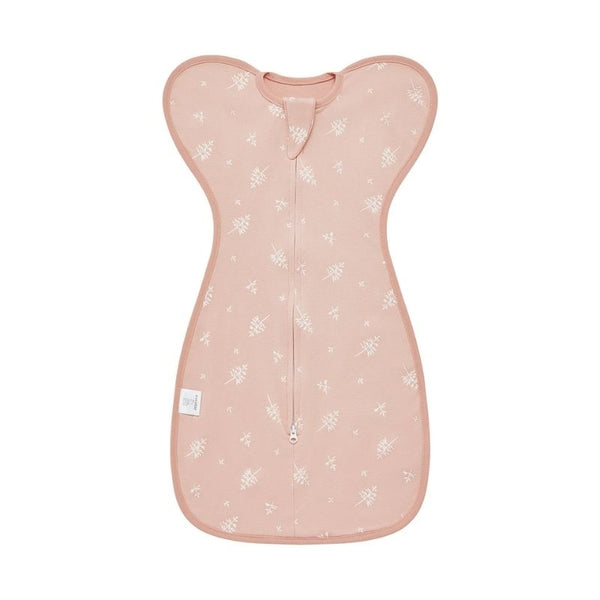 Gigoteuse d'Emmaillotage rose pâle avec imprimés feuillages blancs, douceur et style pour bébé.