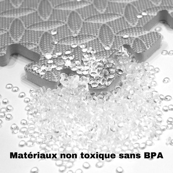 Tapis d'éveil bébé fabriqué en matériaux sans BPA pour la sécurité des enfants.