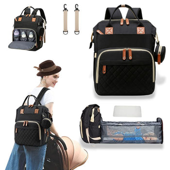 Sac à dos à langer noir, multifonctionnel avec lit intégré et rangement efficace.