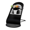 Transat bébé moderne noir avec un design ergonomique et jouets ludiques.