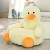 Fauteuil Bébé Animaux canard jaune posé sur un tapis en bois clair