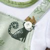 Détail couture et bouton de la bretelle de la Salopette Bébé motif singe