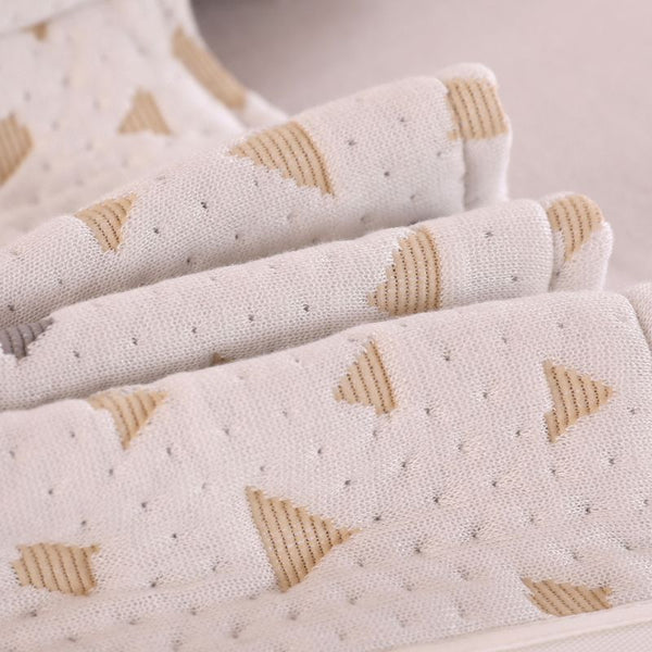 Tissu respirant et doux du Coussin de Grossesse BumpPillow-Duo pour un confort optimal.