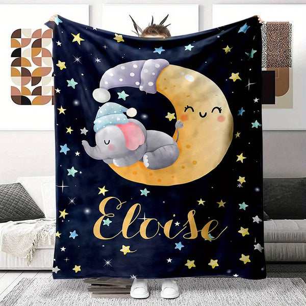 Couverture Bébé Personnalisée avec un éléphant endormi sur une lune étoilée, prénom "Eloise".
