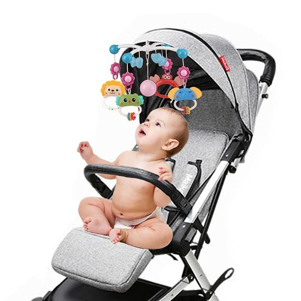 Mobile bébé musical et lumineux facilement installable sur poussette ou berceau avec fonctions musicales.
