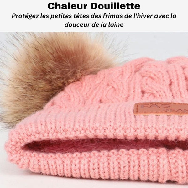Intérieur doux et confortable du Bonnet Double Pompon Bébé rose.