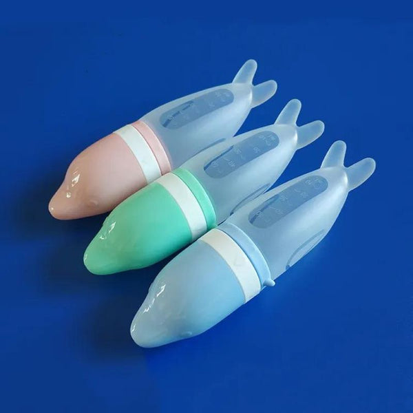 Biberon cuillère en silicone polyvalent, parfait pour les repas et l’hygiène de bébé.