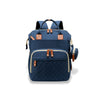 Sac à dos à langer bleu, spacieux et raffiné pour accompagner les sorties familiales.