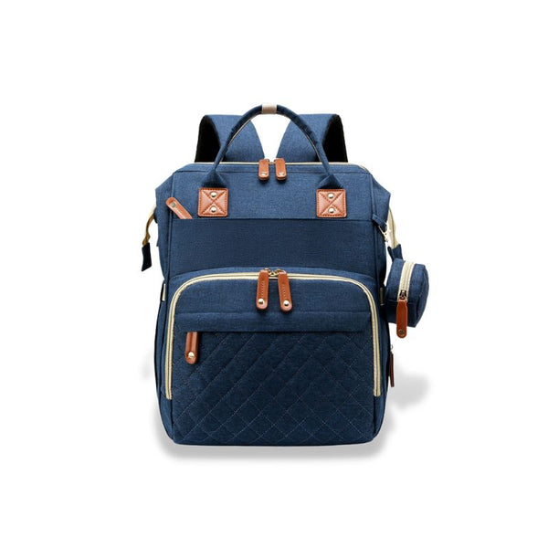 Sac à dos à langer bleu, spacieux et raffiné pour accompagner les sorties familiales.