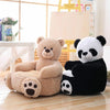 Fauteuil Bébé Animaux BabySofa ours beige et panda noir dans un salon lumineux.