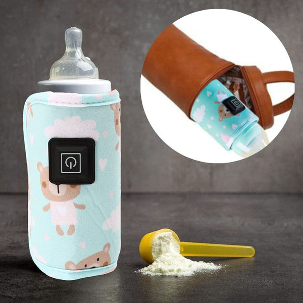 Chauffe biberon nomade accompagné d’un sac et de lait en poudre.