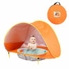 Tente de plage bébé orange avec bassin intégré, sac de transport et accessoires inclus pour une installation rapide.