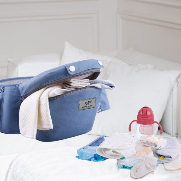 Compartiments pratiques du porte bébé ergonomique pour faciliter les sorties.