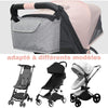 Organisateur de poussette gris compatible avec différents modèles de poussettes.
