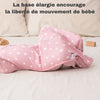 Sécurité et confort réunis dans cette gigoteuse d'emmaillotage rose pour bébé.