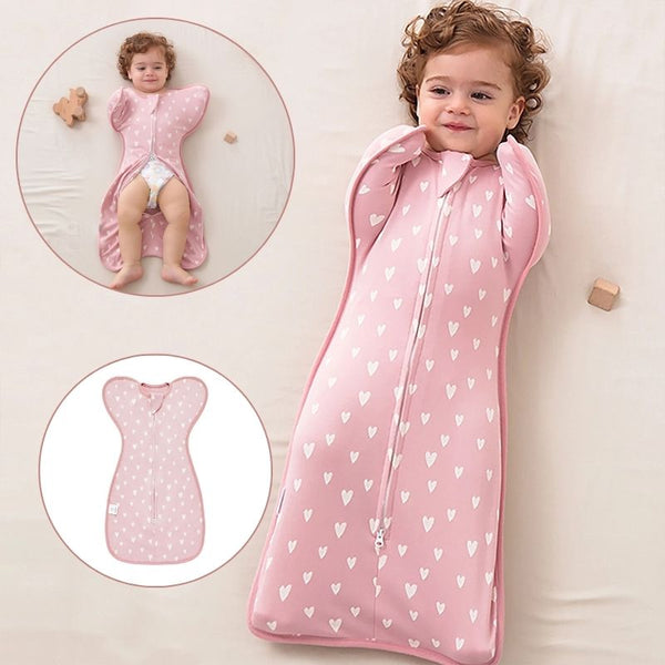 Gigoteuse d'emmaillotage rose pour bébé avec vue détaillée et fermetures éclairs.