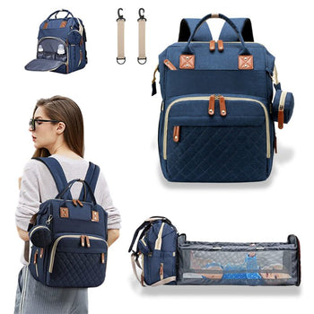 Sac à dos à langer bleu avec compartiments accessibles et lit pour bébé.
