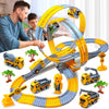 Enfant jouant avec un Circuit Looping monté avec son père - Camions de Chantier pour Enfants - Cocon d’Ange.