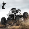 Buggy RC Télécommandé 4x4 Tout Terrain en action sur terrain rocailleux avec télécommande – Cocon d'Ange