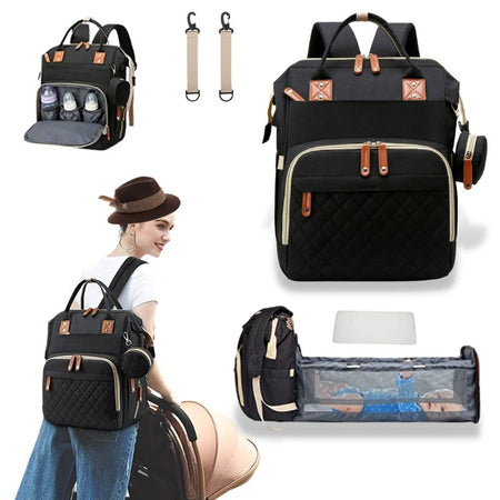 Sac à dos à langer noir, multifonctionnel avec lit intégré et rangement efficace.
