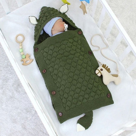 Nid d'ange bébé pratique et élégant pour la chaleur et la sécurité. Modèle vert.