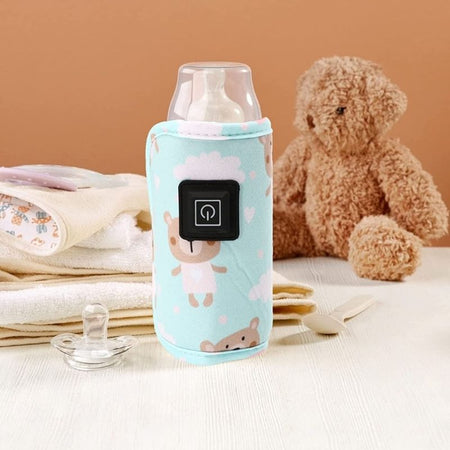 Chauffe biberon nomade sur une table.