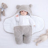 Design chaleureux et réconfortant du nid d'ange bébé gris.