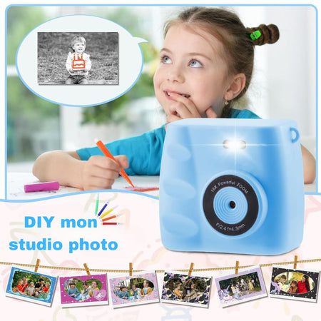 Petite fille créant un album avec son Appareil Photo Enfant à Impression Instantanée