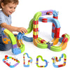 Enfant jouant avec le circuit magnétique MagniTrack et différentes constructions possibles - Cocon d'Ange